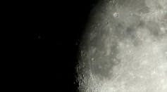 Aldebaran, the brightest star in the constellation of Taurus is seen to the left of the moon before