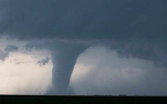 A tornado is seen South of Dodge City, Kansas moving North on May 24, 2016 in Dodge City, Kansas