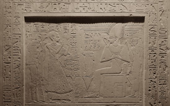 Egyptian gods standing before Osiris.