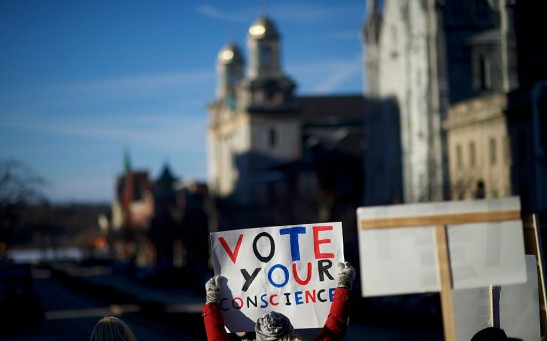 Electoral College Voters Cast Ballots Amid Protests