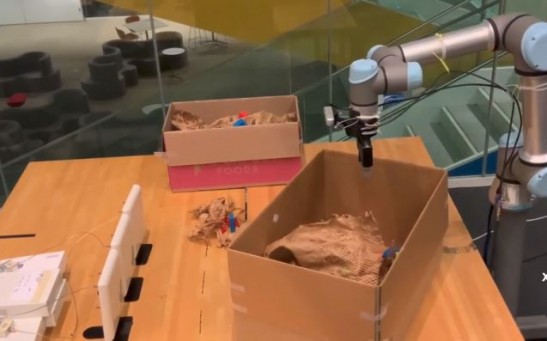 RF Grasp: The robot that finds its way through clutter