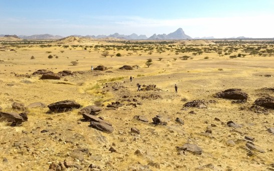 Landscape views of scatters of qubbas around the Jebel Maman.