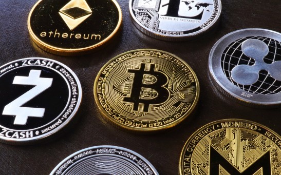 various-cryptocurrency-on-table-5126268
