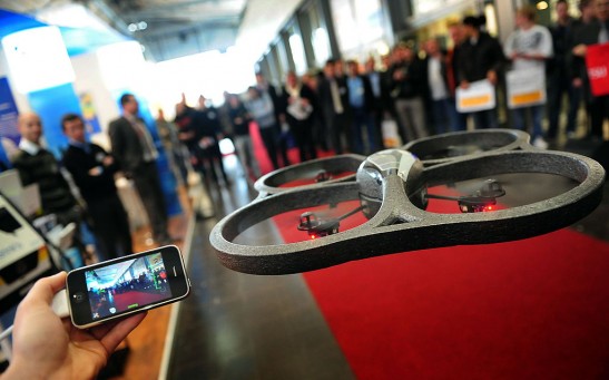 An exhibitor presents the AR Drone