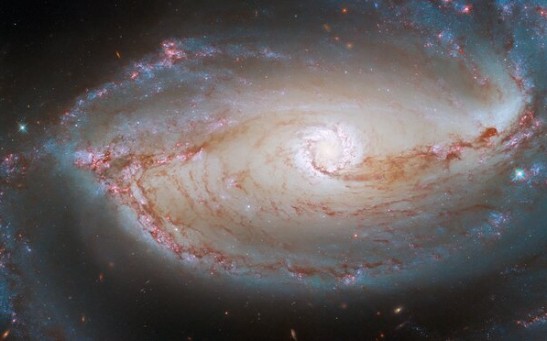  Eye of the Galaxy: Hubble Space Telescope Focuses On A Distant Barred Spiral Galaxy