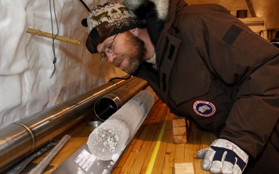 Anders Svensson inspecting an icecore in Greenland 