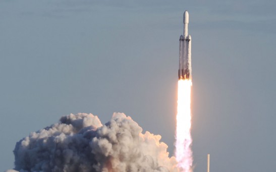 SpaceX Falcon Heavy Rocket Launches Communications Satellite