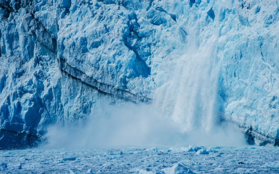 A melting glacier falling apart. 