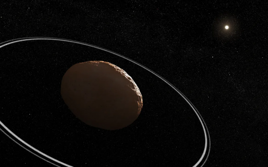 Artist's impression of Chariklo and its rings around the sun.
