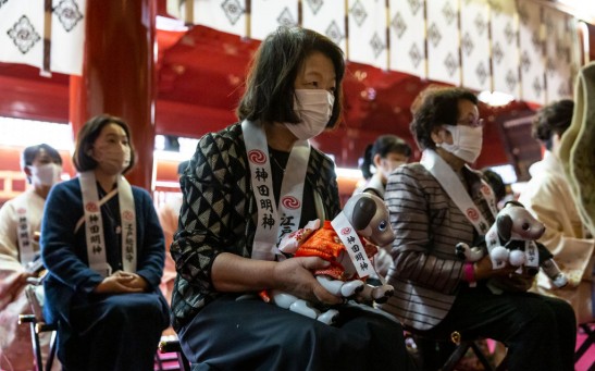 Robot Dogs Pray At Tokyo's Kanda Shrine