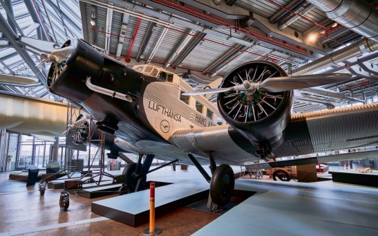 an airplane is on display in a museum