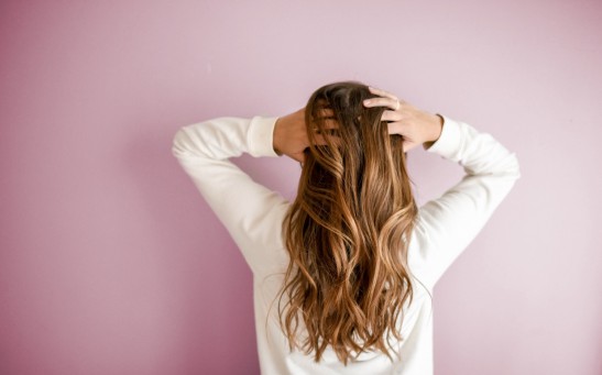 Is Hair Training Effective? TikTok Trend Claims It Reduces Oil Production, but Experts Urge Caution