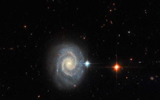 Hubble Space Telescope Shares Image of  a 'Forbidden' Light from Distant Galaxy That Defies Quantum Physics Rules